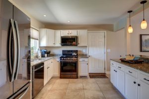 Spacious kitchen with granite counters