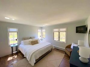 Master Bedroom/Main Floor with King bed and ensuite bathroom