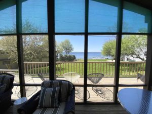 view of lake from screened porch