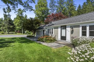 Front exterior showing spacious parking area