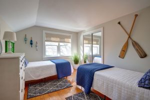 Second level guest bedroom #3 with two twin beds