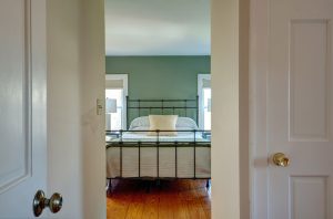 Second level guest bedroom #1 with queen bed