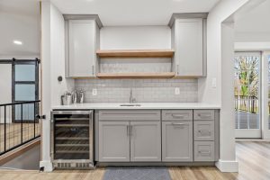 Wet Bar w/beverage fridge between Kitchen, Dining, Living room