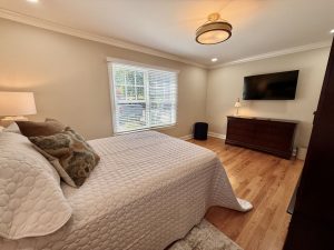 Main Floor - Bedroom 2-Queen Bed (facing road)